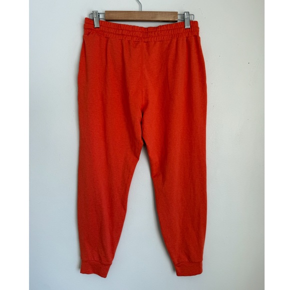 Vuori Performance Jogger Pants in Grapefruit Heather Orange - Picture 8 of 9
